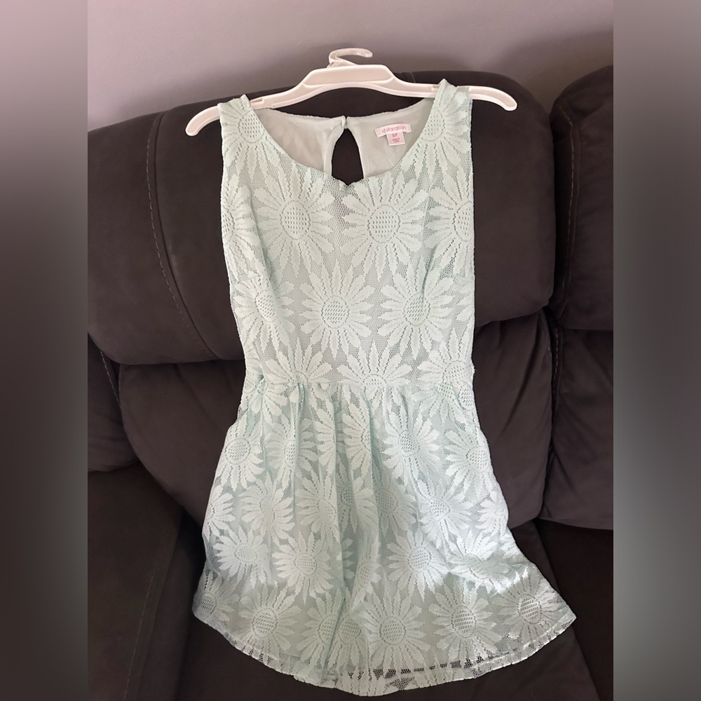 Teen dress size small, will also fit a young girl size 14/16